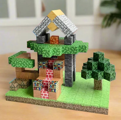 Maison pixelisée avec arbre construite en blocs magnétiques